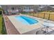 Inviting in-ground pool with wooden deck at 6803 E Highway 19, Loris, SC 29569