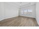 Relaxing bedroom with hardwood floors and large windows at 692 Cherry Blossom Dr., Murrells Inlet, SC 29576