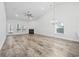 Spacious living room with hardwood floors and a fireplace at 692 Cherry Blossom Dr., Murrells Inlet, SC 29576