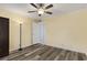 Bedroom with laminate wood floor and ceiling fan at 800 Egret Circle # 57, Little River, SC 29566