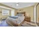 Cozy bedroom offers natural light and rustic furnishings, with a beachside feel at 820 9Th Ave. S, North Myrtle Beach, SC 29582