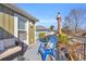 Relaxing deck area with a grill, comfortable seating, and views of the neighborhood at 820 9Th Ave. S, North Myrtle Beach, SC 29582