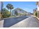 Home's exterior, showcasing elevated design and landscaping at 820 9Th Ave. S, North Myrtle Beach, SC 29582