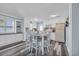 Well-equipped kitchen with white cabinets and a dining area at 820 9Th Ave. S, North Myrtle Beach, SC 29582