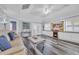 Bright living area features a cozy fireplace, built-in shelving, and backyard access at 820 9Th Ave. S, North Myrtle Beach, SC 29582