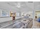 Open-concept living area flows into a well-equipped kitchen with a breakfast bar at 820 9Th Ave. S, North Myrtle Beach, SC 29582