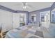 Comfortable main bedroom featuring calming blue walls and a coastal theme at 820 9Th Ave. S, North Myrtle Beach, SC 29582