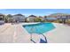 Community pool with surrounding patio and lounge chairs at 820 9Th Ave. S, North Myrtle Beach, SC 29582