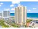 Stunning high-rise condo building with beach views and many parking spots for residents and visitors at 8560 Queensway Blvd. # 706, Myrtle Beach, SC 29572