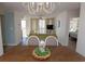 Open-concept living and dining area with balcony access and stylish decor at 8560 Queensway Blvd. # 706, Myrtle Beach, SC 29572