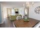 Bright living room with balcony access, comfortable sofa, and modern decorations at 8560 Queensway Blvd. # 706, Myrtle Beach, SC 29572