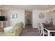 Cozy living room and dining area with light wood floors and modern decor at 8560 Queensway Blvd. # 706, Myrtle Beach, SC 29572