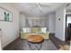 Comfortable living area that features a hardwood floor and natural light throughout the home at 8560 Queensway Blvd. # 706, Myrtle Beach, SC 29572
