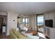 Relaxing living room area featuring a view of the beach and ocean through the sliding glass doors at 8560 Queensway Blvd. # 706, Myrtle Beach, SC 29572
