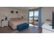 Bedroom with a king-size bed and ocean views from private balcony at 8560 Queensway Blvd. # 706, Myrtle Beach, SC 29572