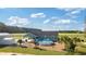 Aerial view of backyard featuring the above-ground pool, lush green grass, and landscaping at 926 Eula Dr., Conway, SC 29526