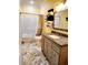 Cozy bathroom featuring a vanity, toilet, tub and shower combination, with marble floors at 926 Eula Dr., Conway, SC 29526