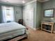 Bright bedroom with a king-size bed and double doors to closet at 926 Eula Dr., Conway, SC 29526