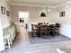 Formal dining room featuring a wooden table set, chandelier lighting, and stylish decor at 926 Eula Dr., Conway, SC 29526