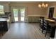 Bright dining area with patio access and decorative chandelier at 926 Eula Dr., Conway, SC 29526