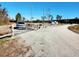 Long driveway leading to home with wooden fence at 926 Eula Dr., Conway, SC 29526