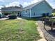 Exterior view of home featuring car port, hot tub, vegetable garden, green space and gravel at 926 Eula Dr., Conway, SC 29526