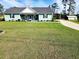 Charming single-story home with a well-manicured lawn and a detached carport at 926 Eula Dr., Conway, SC 29526