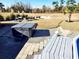 Backyard view featuring a hot tub and deck with seating area, perfect for outdoor relaxation at 926 Eula Dr., Conway, SC 29526