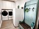 Laundry room with washer, dryer, and extra refrigerator at 926 Eula Dr., Conway, SC 29526