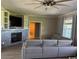 Cozy living room features a fireplace, built-in shelves, and neutral decor at 926 Eula Dr., Conway, SC 29526