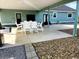 Spacious covered patio with ample seating for outdoor dining and entertaining at 926 Eula Dr., Conway, SC 29526