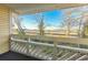 Cozy balcony offers scenic natural views of wild vegetation and trees at 1100 Possum Trot Rd. # H234, North Myrtle Beach, SC 29582