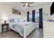 Spacious bedroom with king-size bed, ample closet space, and large windows at 1204 Passante Ave., Myrtle Beach, SC 29572