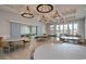 Elegant community room featuring round tables and modern chandeliers at 1204 Passante Ave., Myrtle Beach, SC 29572