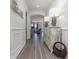 Bright entryway with hardwood floors, decorative console table, and access to living room at 1204 Passante Ave., Myrtle Beach, SC 29572