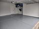 Garage with epoxy floor and overhead storage at 1204 Passante Ave., Myrtle Beach, SC 29572