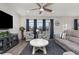 Spacious living room with hardwood floors, comfortable seating, and large windows at 1204 Passante Ave., Myrtle Beach, SC 29572