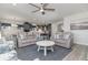 Relaxing living room with hardwood floors, comfortable sofas, and view into kitchen at 1204 Passante Ave., Myrtle Beach, SC 29572