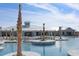 Resort-style pool with palm trees and lounge chairs at 1204 Passante Ave., Myrtle Beach, SC 29572