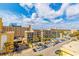 Exterior view of the complex showcasing its outdoor pool, parking, and tropical landscaping at 1207 S Ocean Blvd. # 50707, Myrtle Beach, SC 29577