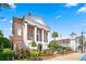 Elegant brick City Hall with white columns and manicured landscaping, symbolizing civic pride and beauty at 1213 Pineridge St., Conway, SC 29527