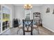 Cozy dining area with a glass table and a view of the outdoors at 1213 Pineridge St., Conway, SC 29527