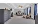 Spacious main bedroom featuring a trey ceiling, ceiling fan, sitting area, and dresser at 1213 Pineridge St., Conway, SC 29527