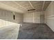 Unfinished garage with single door at 1300 Crested Iris Way, North Myrtle Beach, SC 29582