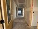 Interior hallway in new construction home with drywall at 1300 Crested Iris Way, North Myrtle Beach, SC 29582