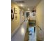 Bright hallway with decorative nautical accents leading to other rooms in the home at 1310 Beautyberry Way, North Myrtle Beach, SC 29582