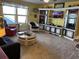 Cozy living room with nautical decor, a built-in entertainment center, and comfortable seating at 1310 Beautyberry Way, North Myrtle Beach, SC 29582