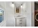 Simple bathroom with a single vanity, marble countertop, and a window at 147 Anglers Dr., Murrells Inlet, SC 29576