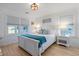 Spacious bedroom with a king-size bed, white dresser, and two lamps at 147 Anglers Dr., Murrells Inlet, SC 29576