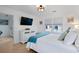 Main bedroom with king bed, white dresser, TV, and access to the hallway at 147 Anglers Dr., Murrells Inlet, SC 29576